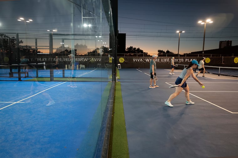 Pickleball is played on the courts to the right while padel is played on the courts to the left at Viva Padel & Pickleball in Philadelphia on Oct. 1.