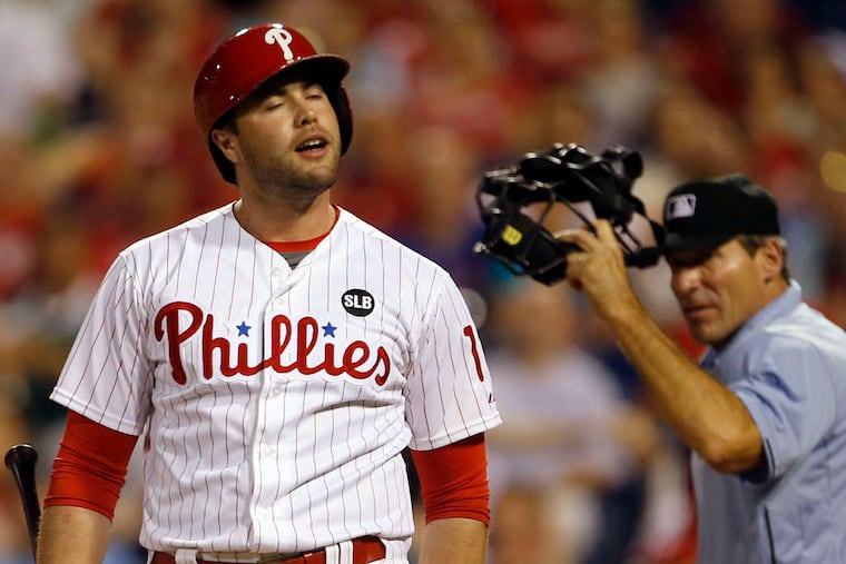 The Phillies' Darin Ruf reacts after umpire Angel Hernandez called him out on strikes in April 2019.