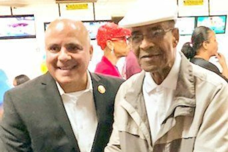 Former Camden Mayor Aaron Thompson (right) with the current mayor, Frank Moran.