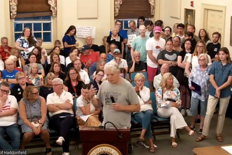 A man speaks about a proposed ordinance to ban sleeping outdoors at night in public areas in Haddonfield Borough during a public meeting Monday night.