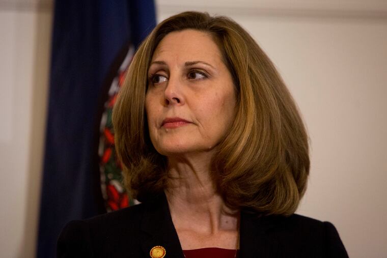 FILE -- Virginia first lady Pam Northam listens as her husband addresses the media Saturday, Feb. 2, 2019, at the Executive Mansion in Richmond. (Photo for the Washington Post by Julia Rendleman)