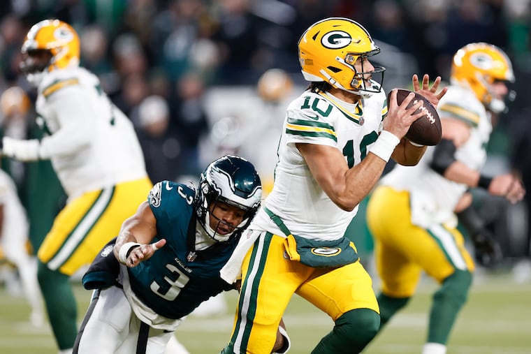 Eagles linebacker Nolan Smith Jr., goes after Green Bay Packers quarterback Jordan Love in January's NFC wild card playoff game.