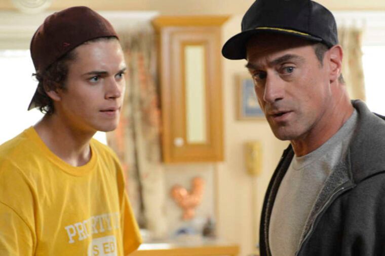 Christopher Meloni (right) is deliciously derisive as Jack Dunlevy, father of 16-year-old high school freshman Frankie (Connor Buckley), in "Surviving Jack."