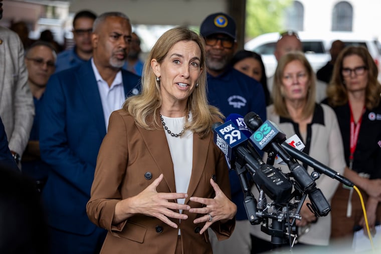 Gov. Mikie Sherrill answers questions from press about the recent rainfall and flooding in Camden at the Fire Administration Building in Camden, N.J., on Tuesday, July 7, 2026.