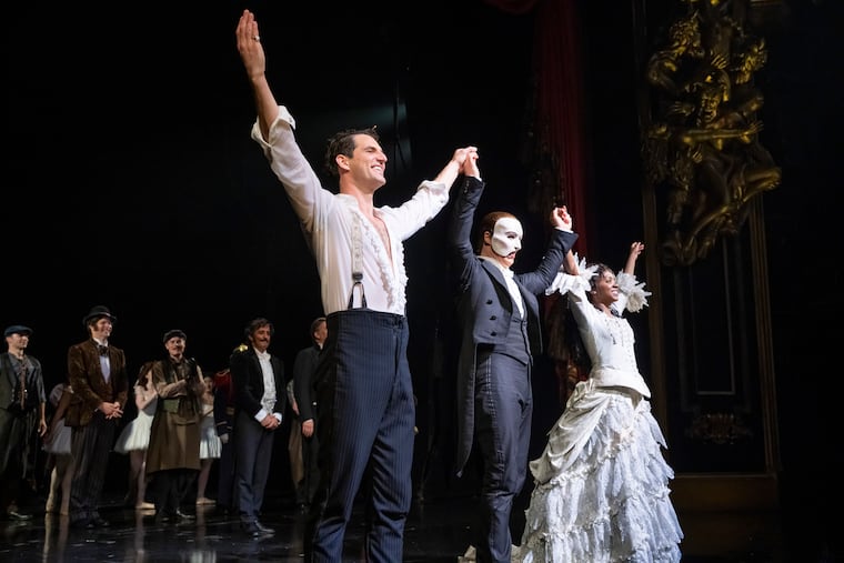 "The Phantom of the Opera" cast appear at the curtain call following the final Broadway performance at the Majestic Theatre on Sunday in New York.