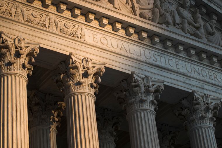 The Supreme Court in Washington at sunse.