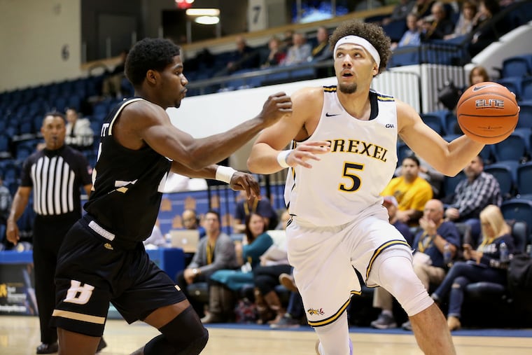 Drexel guard/forward Zach Walton (5) drives past Bryant guard Adam Grant (11) during a game at the Daskalakis Athletic Center in Philadelphia on Wednesday, Nov. 20, 2019.
