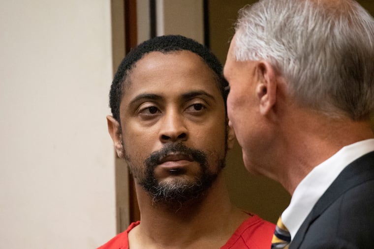 Isaiah J. Peoples appears for his arraignment in Santa Clara County Superior Court as his lawyer, Chuck Smith, stands at his side on Friday, April 26, 2019, in San Jose, Calif. The former U.S. Army sharpshooter Peoples is charged with eight counts of attempted murder after authorities say he deliberately plowed his car into pedestrians Tuesday. (Jim Gensheimer / San Francisco Chronicle via AP, Pool)