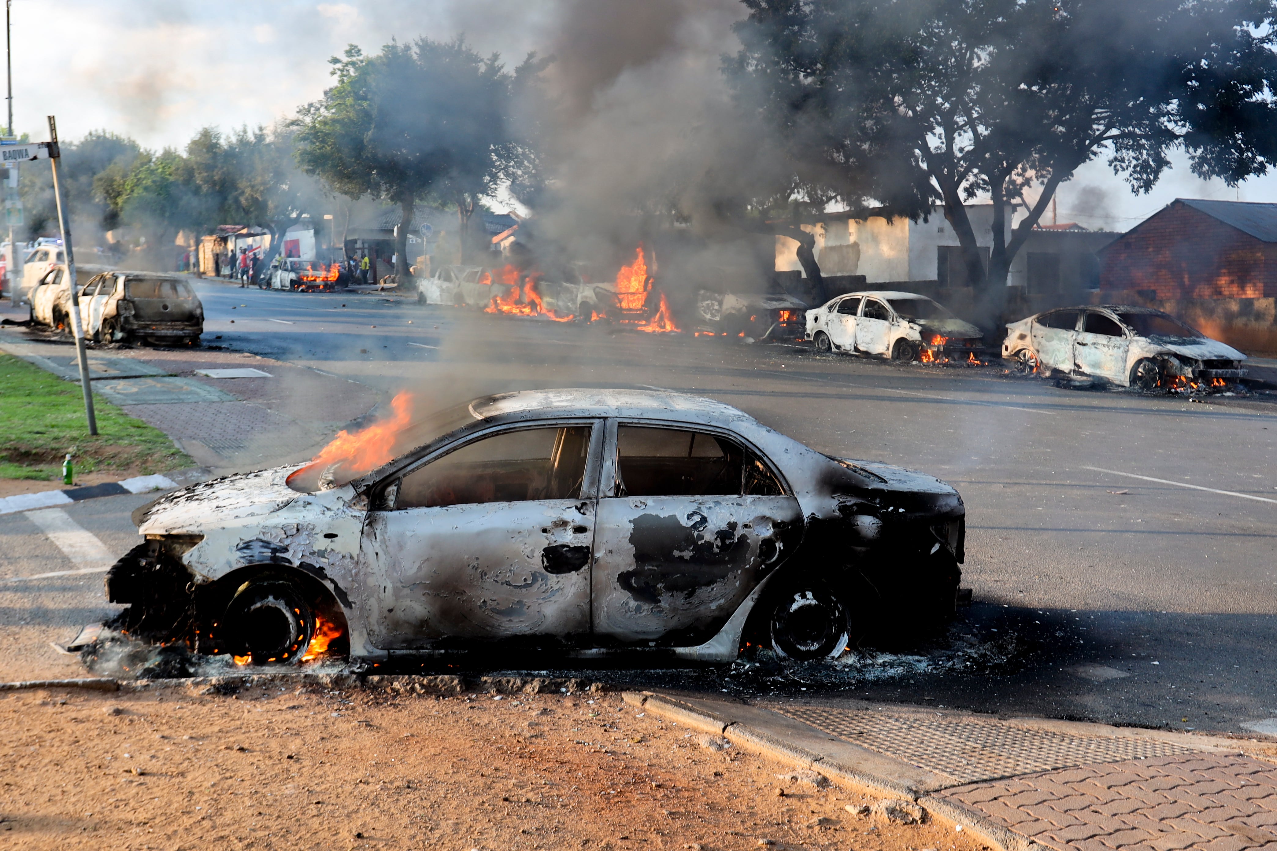 Vehicles torched in South Africa as protests over asylum ruling rage on