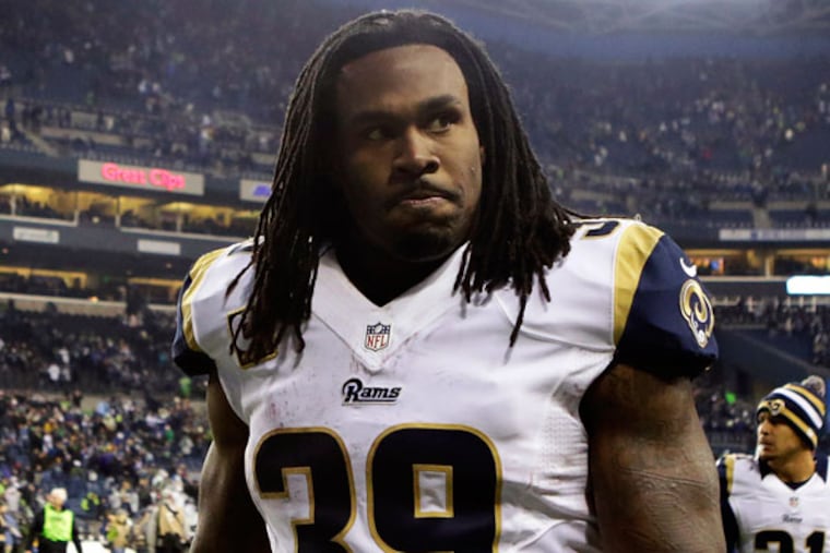 Steven Jackson looks toward fans in the stands as he walks off the field following the Rams' 20-13 loss to the Seattle Seahawks in an NFL football game, Sunday, Dec. 30, 2012, in Seattle. (Stephen Brashear/AP file)