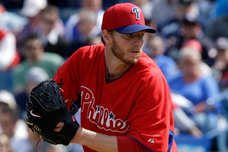 Roy Halladay delivers to the New York Yankees during a MLB spring training baseball game Friday, March 1, 2013, in Tampa, Fla. (Chris O'Meara/AP)