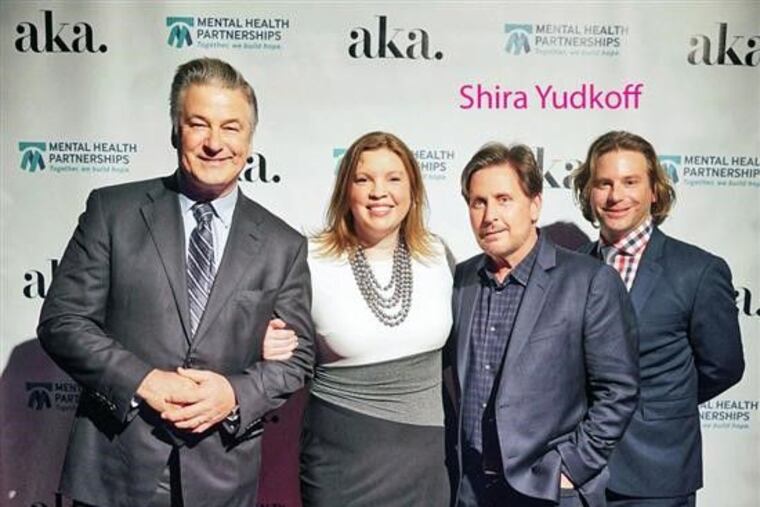 Alec Baldwin and Emilio Estevez pose with moviegoers at the premiere of "The Public"