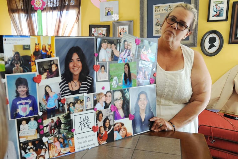 Jayne Grickis is shown with a collage of images of her daughter Jessica Ney at her Bernville, PA home Tuesday June 12, 2018.