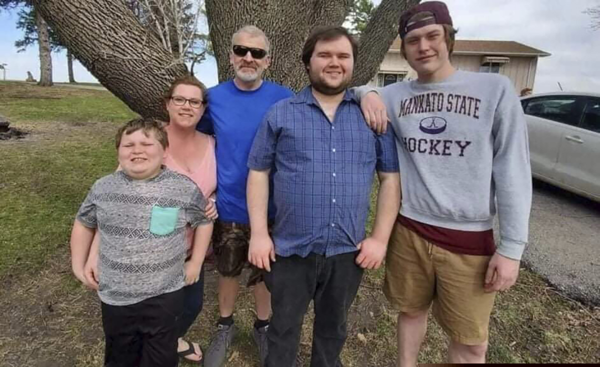 This photo provided by Nancy Sack shows Carter Lange, Kim Gustavson, Jason Lange, Matthew Gustavson and Travis Gustavson. Nancy Sack's grandson, Travis Gustavson, died at age 21 in Mankato after overdosing on what he thought was heroin but was actually laced with fentanyl.