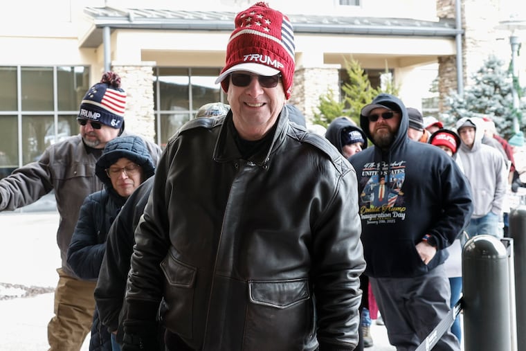 Rick Porvaznik from Middle Smithfield Township waits to hear President Donald Trump as he makes his first stop on an "economic tour," in Mt. Pocono Pa., Tuesday, December 9, 2025.