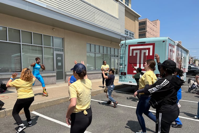 A dance exercise class taking place at the Stroke Awareness Community Day event. The Frazier Family Coalition wants to promote holistic health, not just stroke awareness.