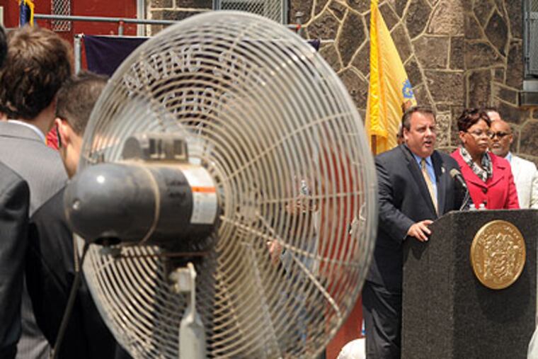 One of three large floor fans set up for Gov. Chris Christie and others outside the Lanning Square School in Camden on Thursday as he speaks alongside Mayor Dana Redd. Christie announced legislation that would allow private companies to run chronically failing schools through a public-private partnership pilot program. (Tom Gralish / Staff Photographer)
