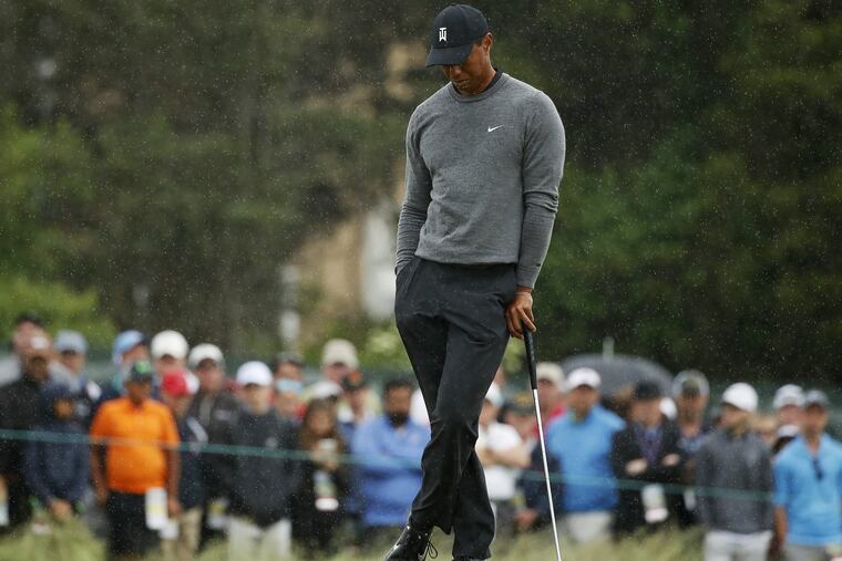 Tiger Woods waits to putt on the 15th green during the second round of the U.S. Open Golf Championship, Friday, June 15, 2018, in Southampton, N.Y.