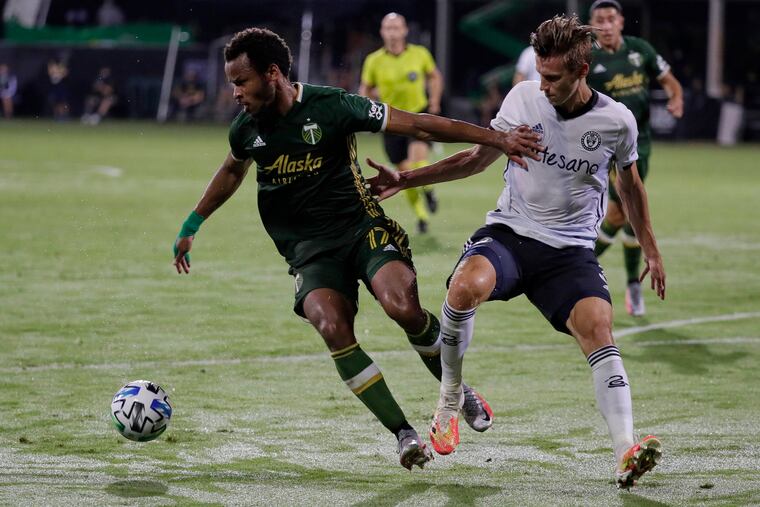 Portland Timbers forward Jeremy Ebobisse, left, scored the Timbers' opening goal.