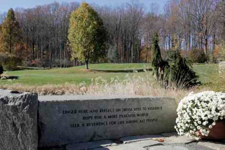 At Brookside Gardens, in Wheaton, Md., a memorial honors the victims of John Allen Muhammad, who randomly killed 10 people by sniper in 2002. Muhammad is slated to die tonight.