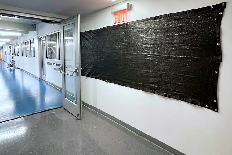 Penn has covered up the signage at the Coach Ted A. Nash Land Rowing Center.