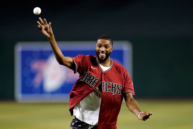 Suns forward and former Villanova star Mikal Bridges throws out the first pitch before the Phillies-Diamondbacks game on Tuesday.