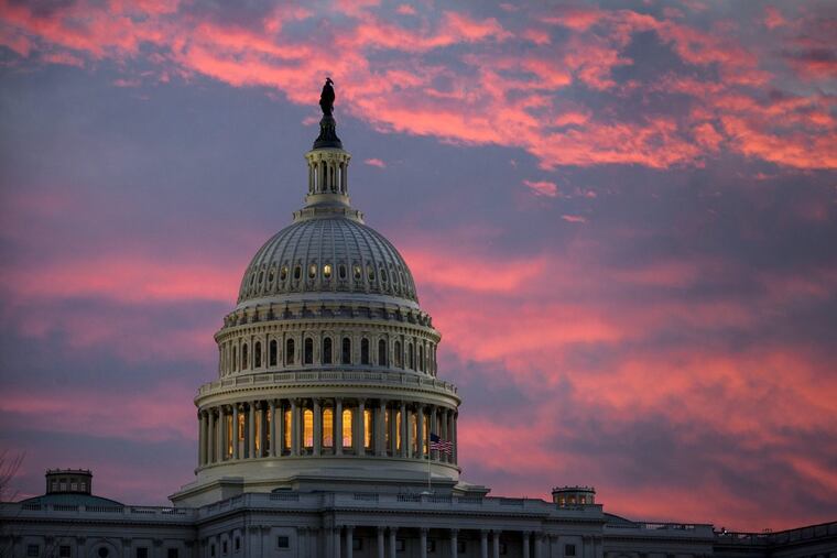 This Thursday, Nov. 30, 2017 file photo shows the U.S. Capitol at dawn in Washington.