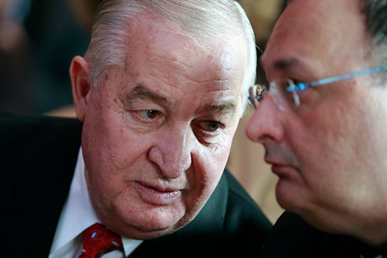 Louis DeNaples, left, talks with The Reverend Joseph Sica at the Mount Airy Casino Resort during opening day ceremonies, in Paradise Township on Oct. 22, 2007. Dauphin County District Attorney Edward Marsico said his office will drop the criminal charges in exchange for DeNaples' agreement not to exercise any legal control over his Mount Airy Casino Resort in the Pocono Mountains. (AP Photo/Steve Klaver, File)