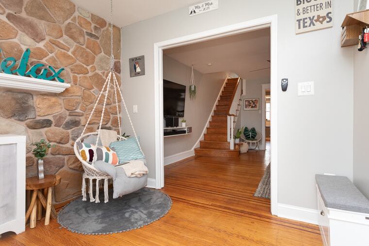 The swing seat in the sunroom of Miriam and Greg Davidson's home.