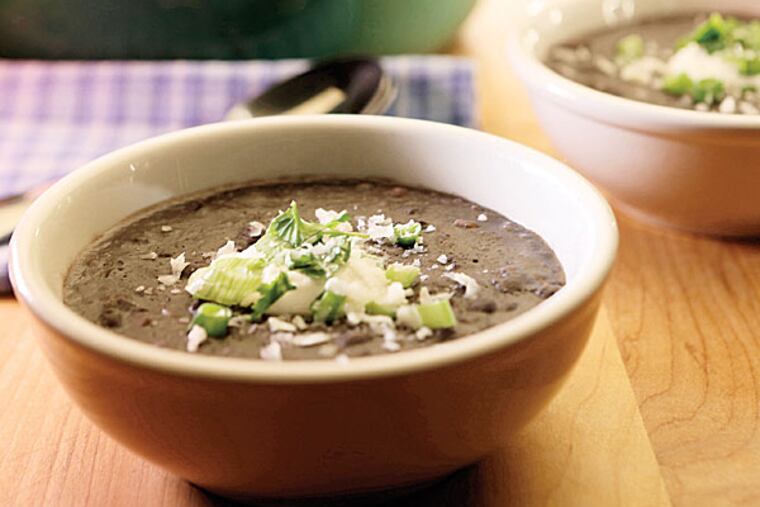The “secret ingredient” in Smoky Black Bean Stew is not presoaking the beans, which makes for a richer flavor. (ANNE CUSACK / Los Angeles Times)