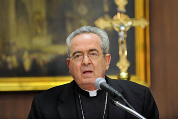 Cardinal Justin Rigali, the Archbishop of Philadelphia, announces that Northeast Catholic High School for Boys and Cardinal Dougherty High School will close at the end of the school year at a press conference Thursday night. (Sharon Gekoski-Kimmel / Staff Photographer)