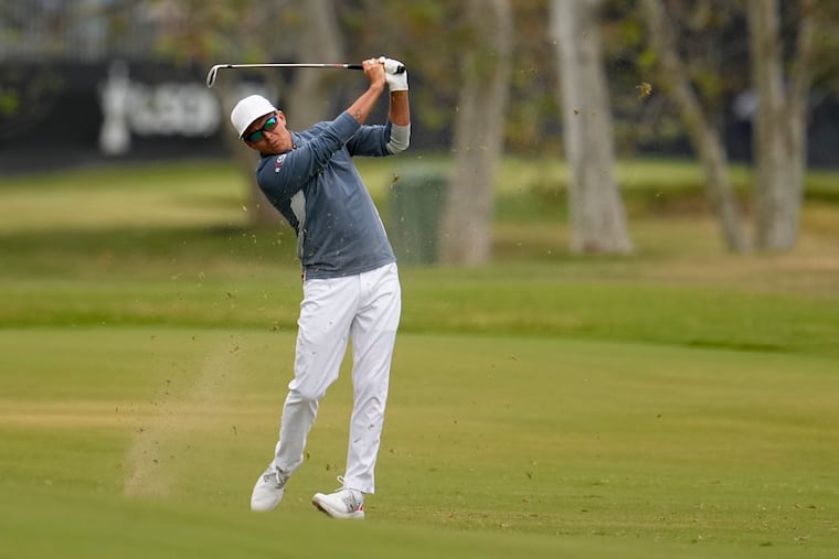 Rickie Fowler hits from the fairway on the second hole during the first round of the U.S. Open golf tournament at Los Angeles Country Club on Thursday, June 15, 2023, in Los Angeles. (AP Photo/George Walker IV)