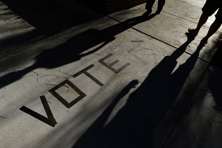 In this Nov. 6, 2018 file photo, voters head to the polls at the Enterprise Library in Las Vegas. Turnout will likely play a large role in choosing the next American president, a Moody's economist says.