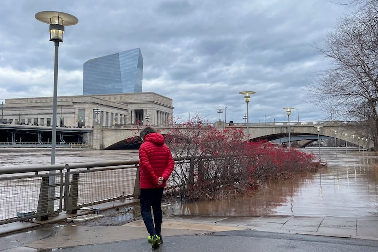 Flooding and flash flooding, shown here along the Schuylkill in Philadelphia in January 2024, are two of the most pressing disaster concerns for residents of the region. There are ways to prepare for a flooding disaster financially, experts say.