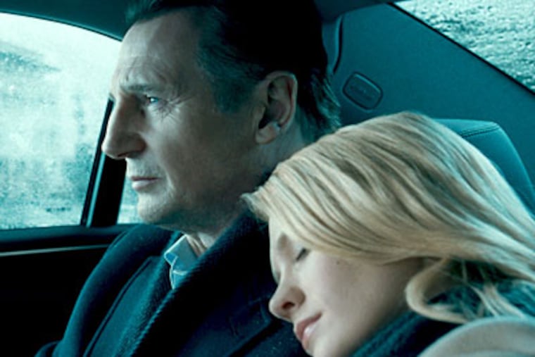 Liam Neeson, left, and January Jones in "Unknown." (AP Photo / Warner Bros. Pictures)