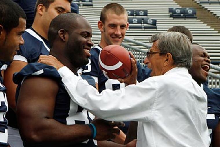 Bani Gbadyu (left) will be one of Penn State's starting linebackers this season. (Gene J. Puskar/AP)