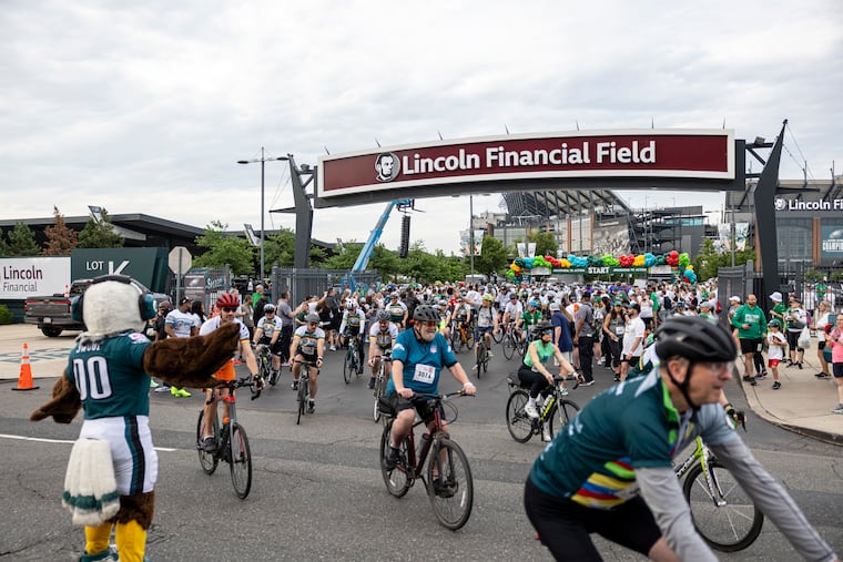 Bikers take off from the starting line for the first event, the Wawa Classic 30-mile ride, at the eighth Annual Eagles Autism Challenge at the Lincoln Financial Field on Saturday.