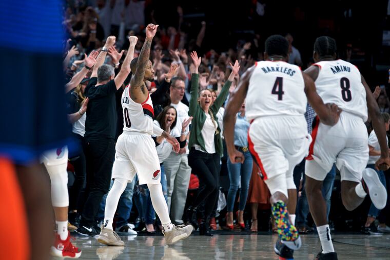 Damian Lillard believes the Blazers can make a run for the playoffs if given a fair chance. (AP Photo/Craig Mitchelldyer)