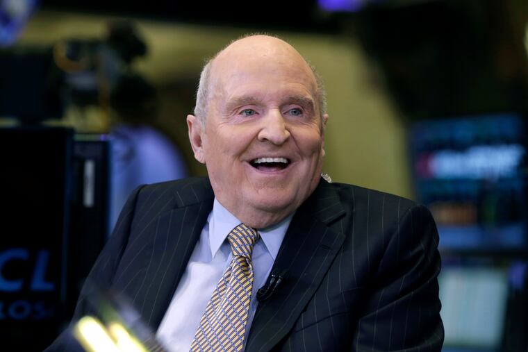 FILE - In this Oct. 22, 2013 file photo, former Chairman and CEO of General Electric Jack Welch appears on CNBC on the floor of the New York Stock Exchange. Welch, who transformed General Electric Co. into a highly profitable multinational conglomerate and parlayed his legendary business acumen into a retirement career as a corporate leadership guru, has died at the age of 84.