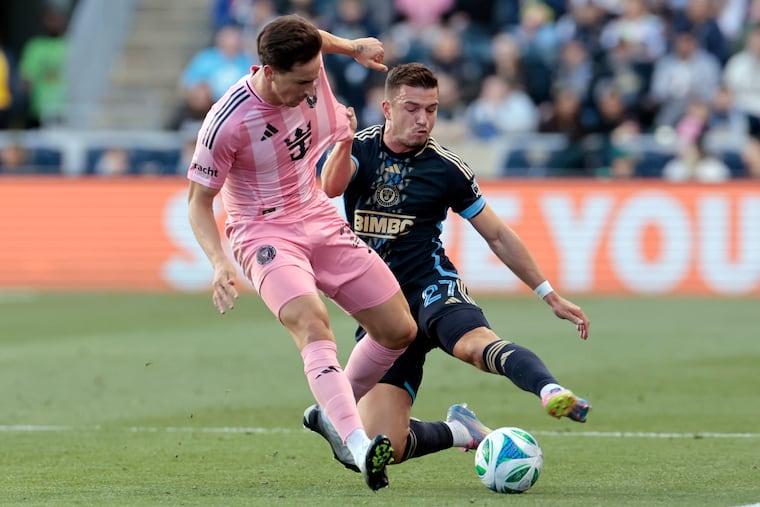 The Union’s Kai Wagner and Miami's Tadeo Allende go after the ball Saturday at Subaru Park. The Union are at the end of a stretch of nine games in 28 days.