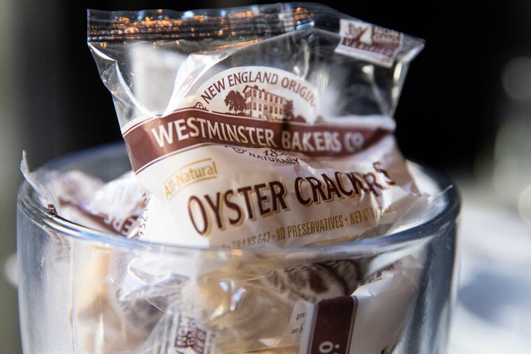 A glass of non-OTC oyster crackers on a table top at Oyster House in Center City.
