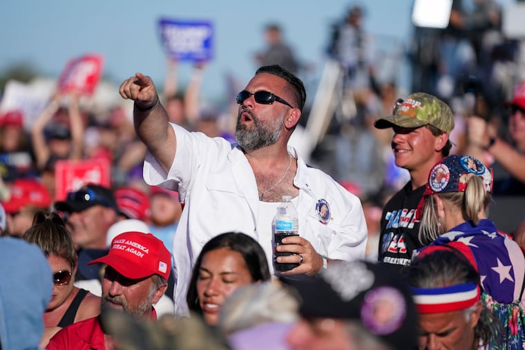 Supporters of former President Donald Trump react as he speaks at a campaign rally at Waco Regional Airport Saturday in Waco, Texas.