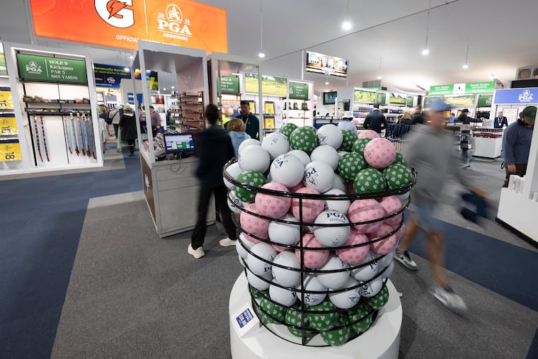 The 50,000-square foot merchandise tent at the PGA Championship is one of the first things fans see when they arrive at Aronimink Golf Club in Newtown Square.