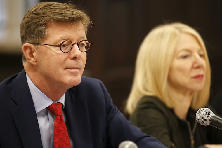 University of Pennsylvania Provost Vincent Price (left) listens to questions with university president Amy Gutmann, after Price announced potential new rules for how it deals with problematic underground fraternities during a meeting a meeting at Penn on Wednesday. YONG KIM / Staff Photographer