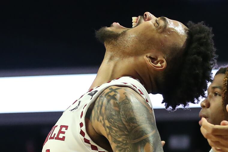 Arashma Parks of Temple celebrates on the bench as Temple increases its lead over Tulsa late in the game at the Liacouras Center on Feb. 5, 2022.