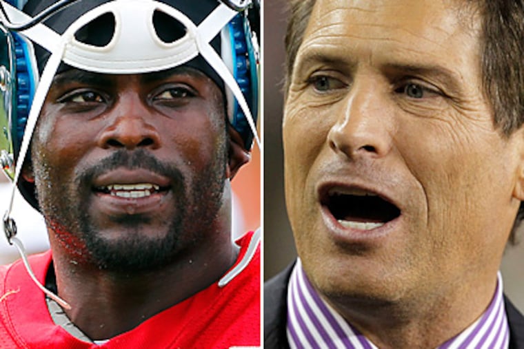 What advice does Hall of Fame quarterback Steve Young have for Michael Vick? (AP Photos)