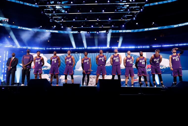 The World Team is introduced at the NBA Rising Stars basketball game in Chicago on Friday.