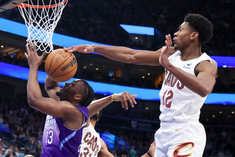 Cleveland Cavaliers forward De'Andre Hunter (right) totaled 15 points and six rebounds in Sunday’s get-right blowout win over the tanking Utah Jazz.