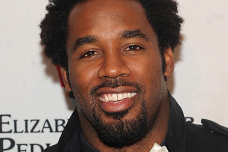 Aside from being a bow-tie buff, Dhani Jones has quite the eye for photography. (AP Photo)