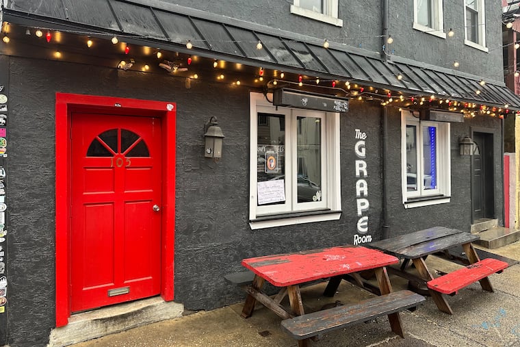 An outdoor photo of the Grape Room, which closed in March 2024 after nearly 40 years in Manayunk with ownership changes and location changes along the way.